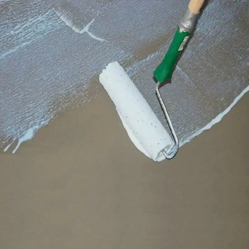 A paint roller applying SBR latex adhesive on a surface, showcasing smooth consistency and even coverage for optimal bonding.