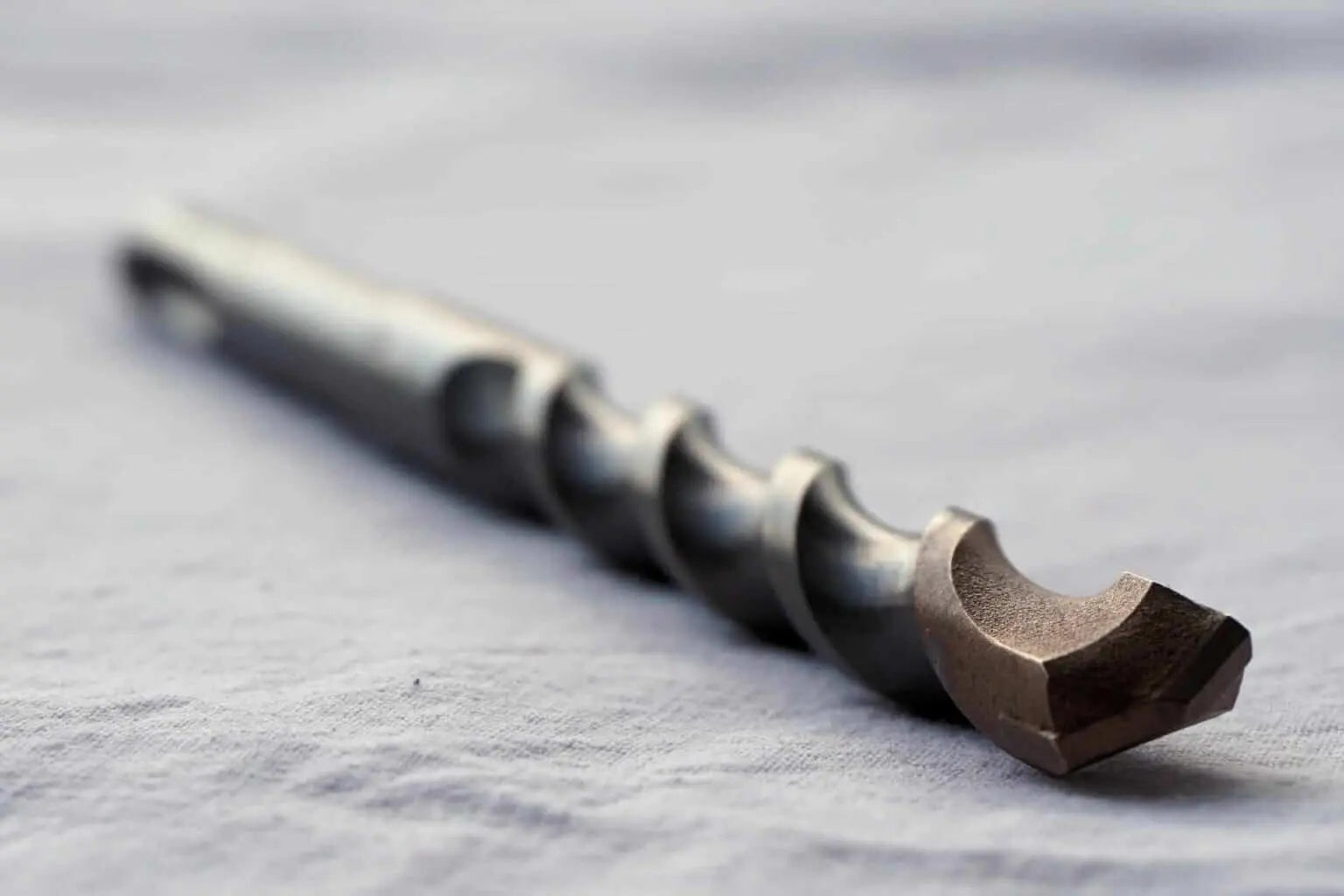 A drill bit lying on it's side