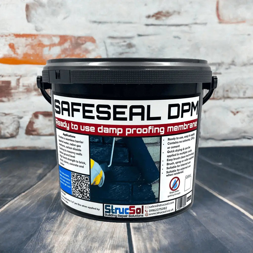 A bucket of liquid damp proofing membrane