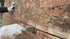 Repointing and finishing trowel for use in crack stitch repairs and repointing