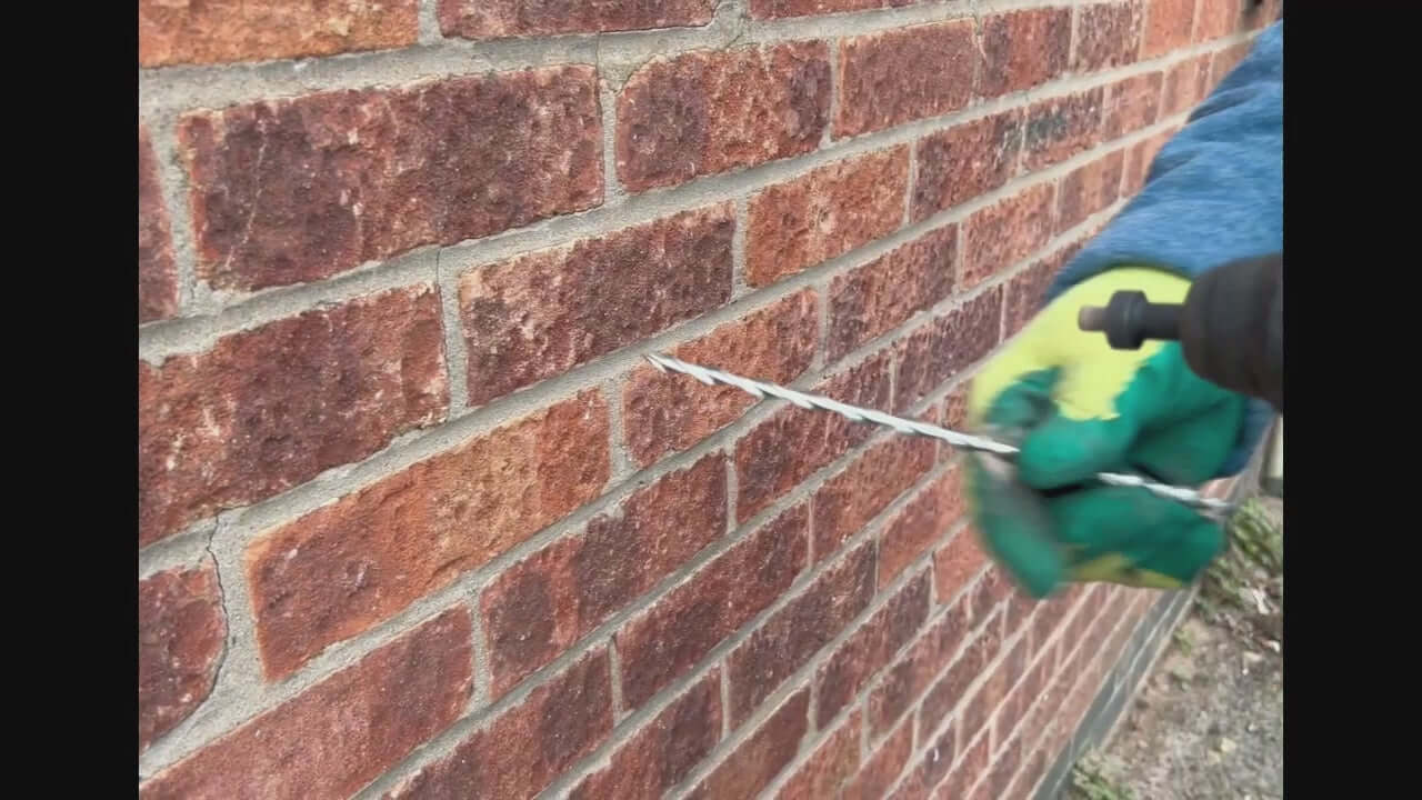 Wall tie install tool being used